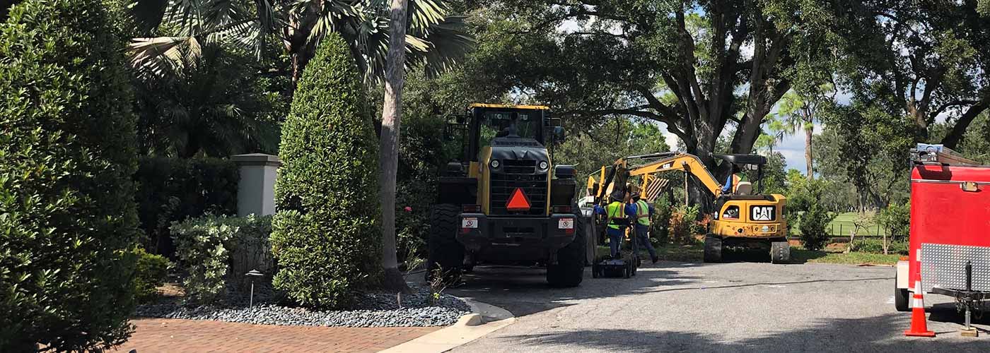 Construction workers and equipment working on a FY19 WMI segement